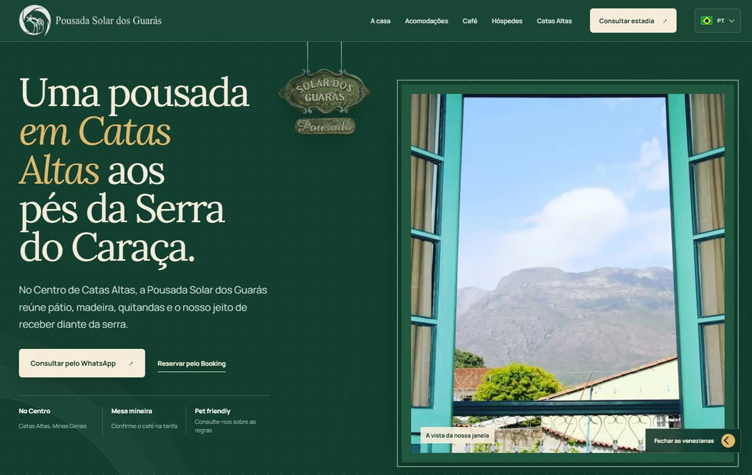 Solar dos Guarás desktop page with accommodation information and a mountain view.